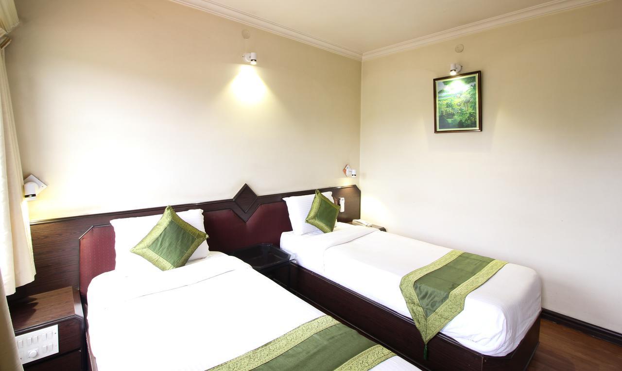 Treebo Trend Royal Inn Mysore Buitenkant foto